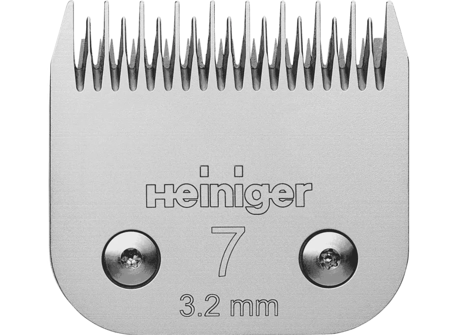 A silver-colored Heiniger snap on clipper blade with the number 7 and 3.2 mm printed on it.
Available at Nice equestrian Wukair Doha Qatar.