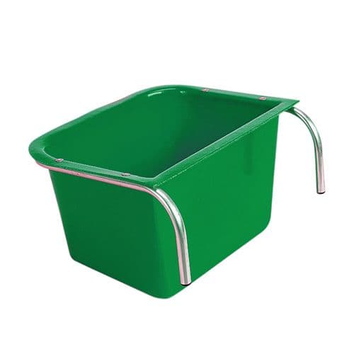 A green portable manger made of metal with a plastic liner, featuring a handle on the side for equestrian stables. Manufactured by Stubbs Abbey England. Available at ice Equestrian Wukair Doha Qatar.