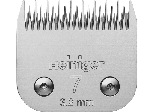 A silver-colored Heiniger snap on clipper blade with the number 7 and 3.2 mm printed on it.
Available at Nice equestrian Wukair Doha Qatar.