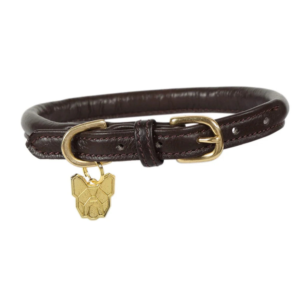 Brown leather dog collar with a gold buckle and tag on a white background.
Available with Nice equestrian Wukair Doha Qatar