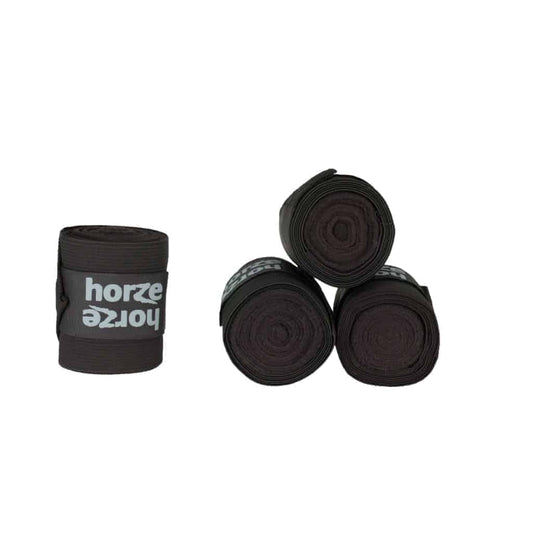A set of black Horze Nesti Comb Bandages, which include fleece wraps and stretch sections for comfort and security.
Horze. Available at Nice Equestrian Wukair Doha Qatar