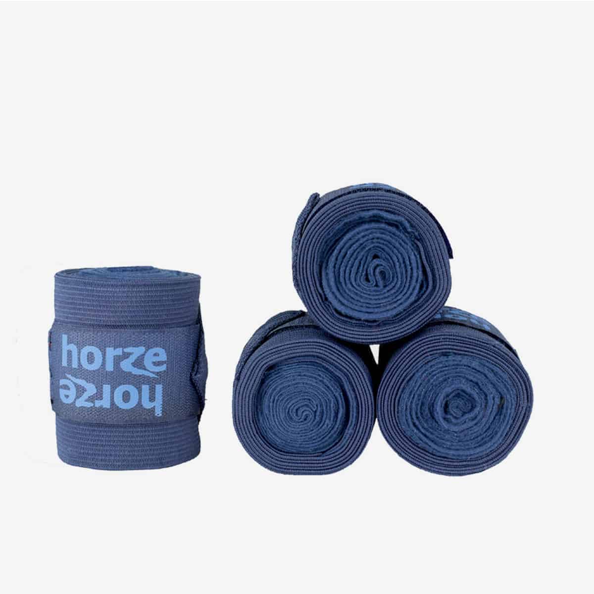 A set of blue Horze Nesti Comb Bandages, which include fleece wraps and stretch sections for comfort and security.
Horze. Available at Nice Equestrian Wukair Doha Qatar