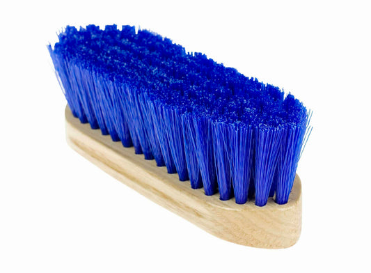 A small dandy brush with blue synthetic bristles and a wooden back, with the Horze logo printed on the back.
Available at Nice Equestrian Wukair Doha Qatar.