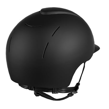 A KEP Italian black equestrian helmet with a visor. KEP Italy helmets available with Nice Equestrian Wukair Doha Qatar. One of the top ranked helmets in the world