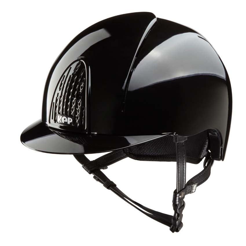 A KEP black equestrian helmet with a glossy finish, featuring a visor and adjustable straps.  KEP Italy helmets available with Nice Equestrian Wukair Doha Qatar. One of the top ranked helmets in the world