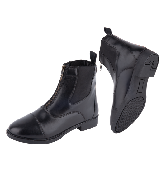 A pair of black jodhpur boots with a zip on the front, designed for equestrians.