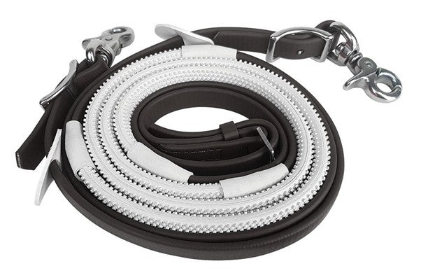 Black and white braided leather reins on a white background.
Zilco Australia.  Available at Nice Equestrian Wukair Doha Qatar.