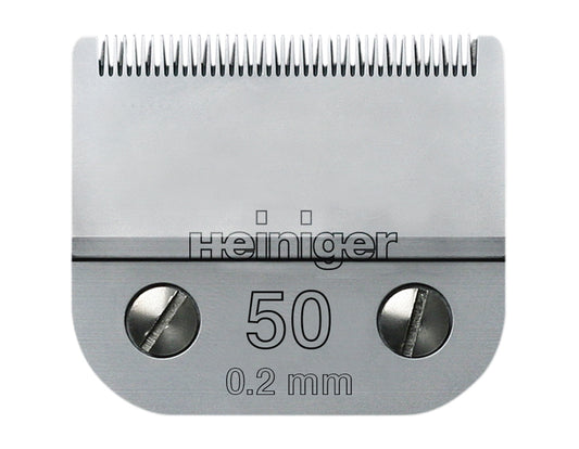 A silver-colored Heiniger snap on clipper blade number 50 with 0.2 mm thickness. Available at Nice Equestrian Wukair Doha Qatar.