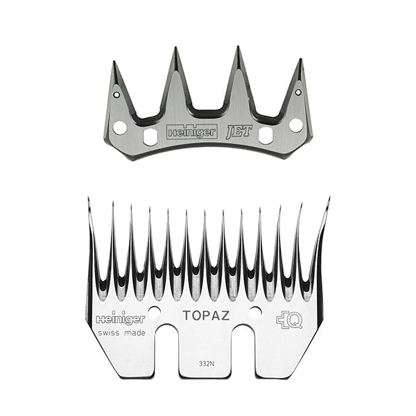 A set of two Heiniger Jet/Topaz sheep shearing knives with black handles and curved blades, one with a Jet logo and the other with a Topaz logo, both marked with 'Made in Switzerland'.
Available at Nice equestrian Wukair Doha Qatar