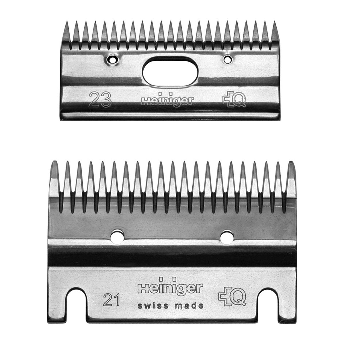 A set of two Heiniger branded shearing blades, with the numbers 21 and 23 visible, indicating the blade size.
Available at Nice equestrian Wukair Doha Qatar.