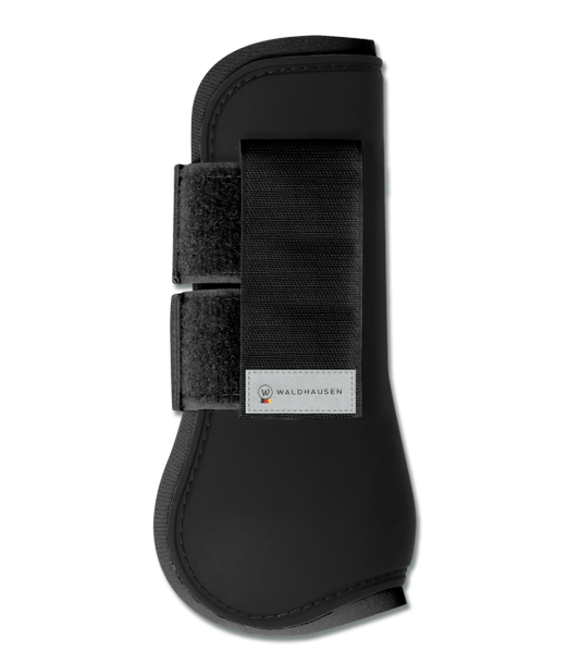 A black horse tendon boot with black straps and a hard-shell exterior, designed for leg protection.