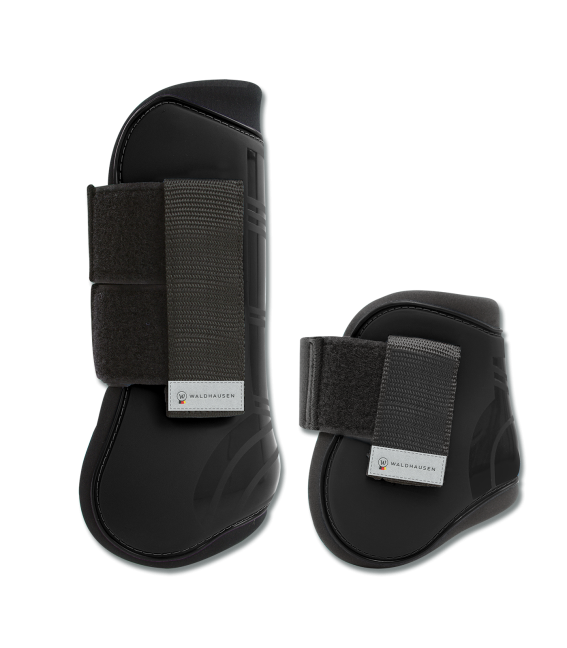 A set of black horse tendon and hind boots with Velcro fasteners.