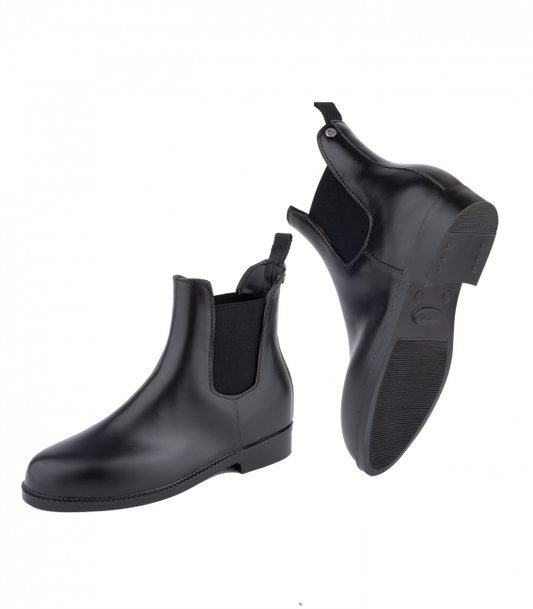 A pair of black Chelsea Jodhpur boots with elastic side panels and a non-slip sole, designed for equestrian activities.